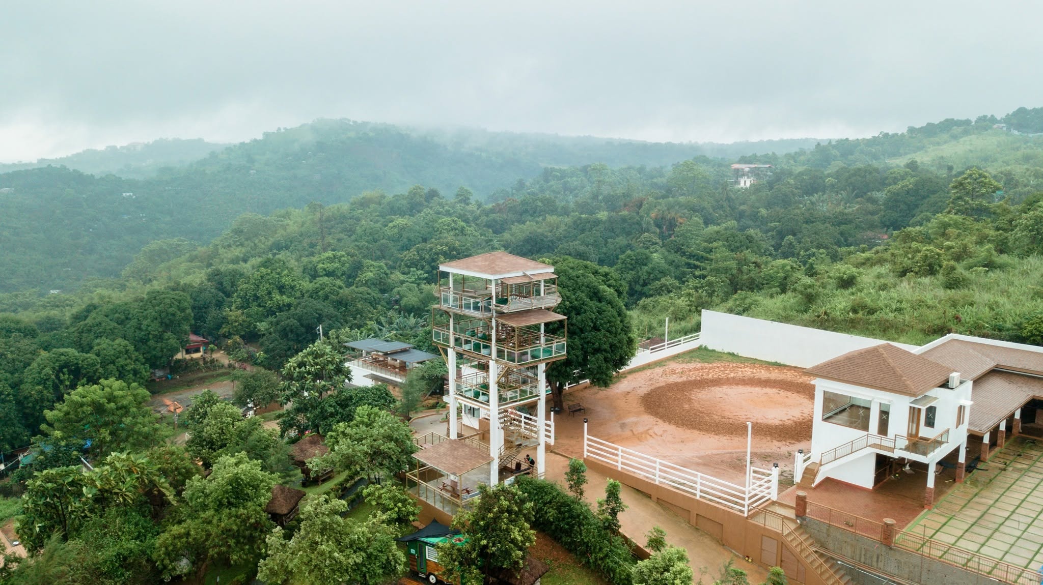 Sky Tower platform overlooking green hills and the distant city